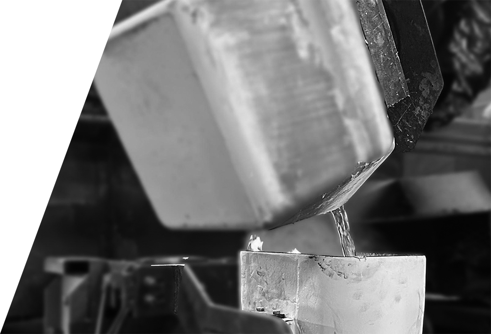 Molten aluminum being poured into a mold, illustrating the foundry process at BRP Spruce Pine