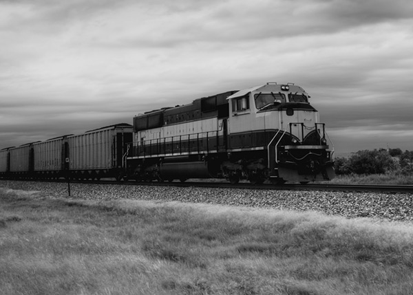 Freight train on a railway track, representing the rail sector served by BRP Spruce Pine